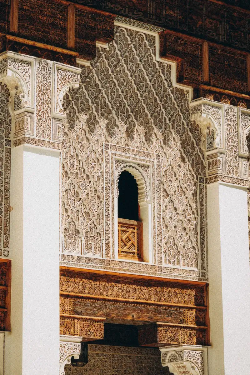 Ornately carved plaster and painted cedar detail of traditional Moroccan architecture